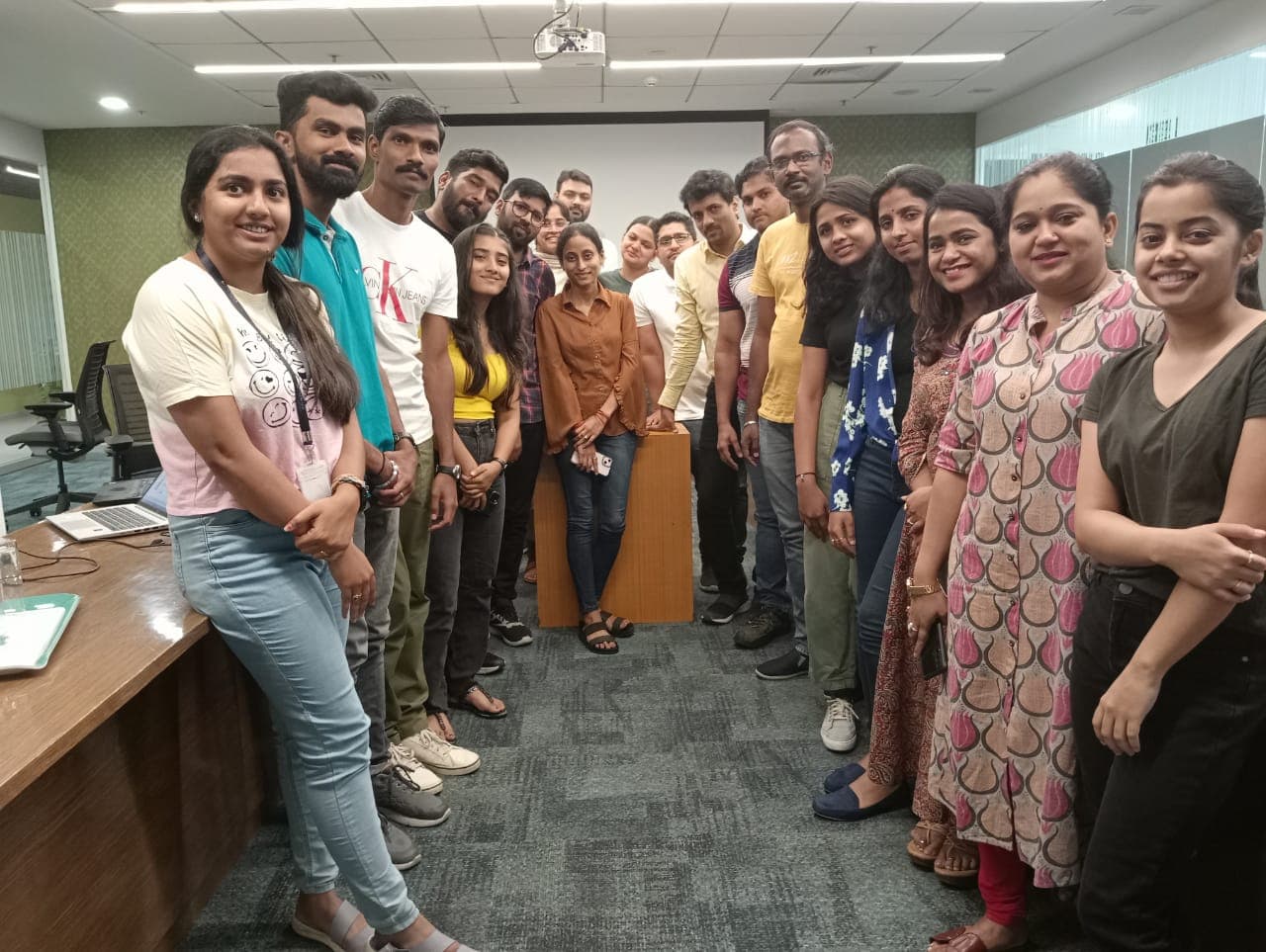Group photo of professionals after a Technovids corporate training session