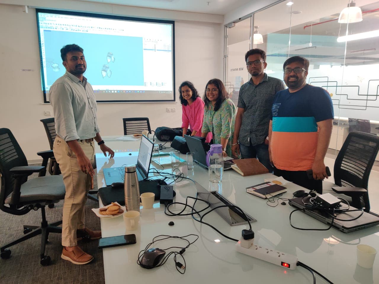 Group of professionals standing together after a software training session